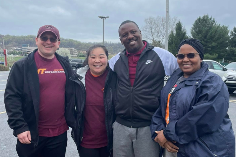 Central Pennsylvania Hokies pose for a photo at a chapter event