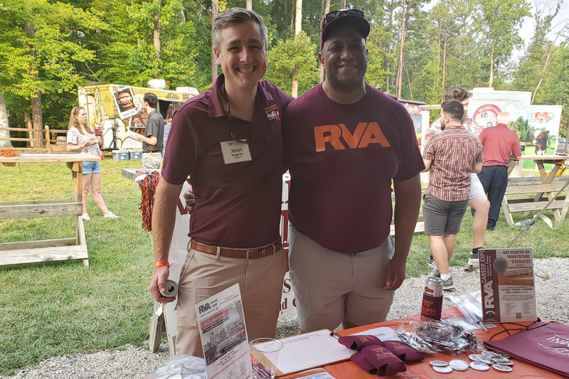 Two Richmond alums pose for a photo at Hardywood