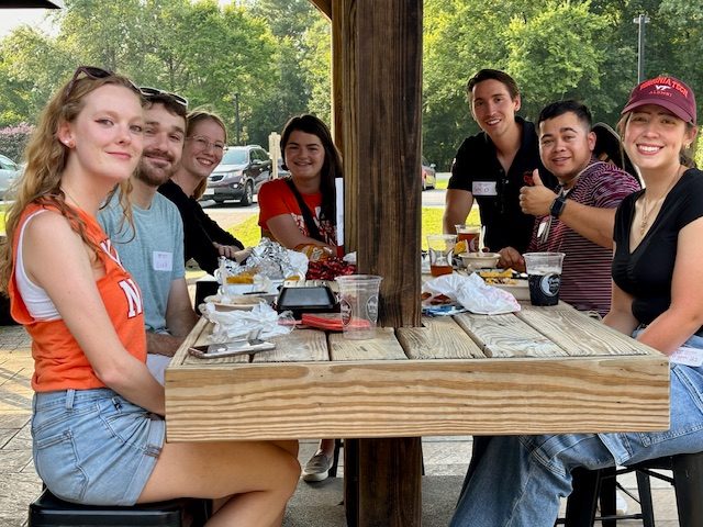New Hokies sitting at a picnic table